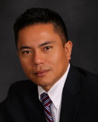 Top Rated Business Litigation Attorney in Costa Mesa, CA : Roland Tong