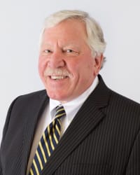 Thomas E. Brever
