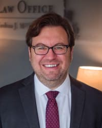 Joshua J. Mikrut