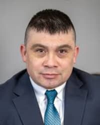 Top Rated Family Law Attorney in New Brunswick, NJ : Raul E. Menar