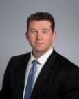 Adam M. Jurach