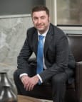 Adam T. Schnatz