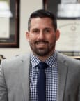 Adam J. Savin