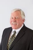 Thomas E. Brever