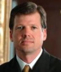 James E. Girards