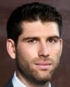 Adam M. Satnick