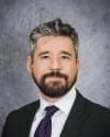 Adam M. Looney