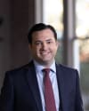 Justin C. Dewett