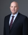 Christian K. Adams