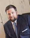 Justin K. Thomas