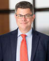 V. John Ella