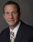 Dennis A. First
