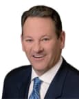 John M. Dodig