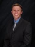 Tyler J. Belong