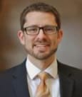 Darren M. Sharp