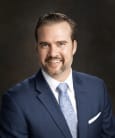 Joshua J. Coe