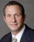 Dennis A. First