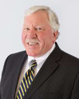 Thomas E. Brever