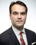 John P. Buza
