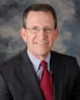 Bruce E. Miller