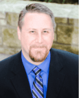 Justin D. Niedens