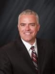 Brian K. Tackett