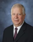 John E. Hughes