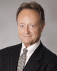 Thomas E. Miller