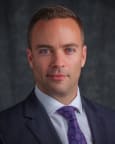 Gregory E. Stuhlman