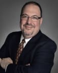 Top Rated Trademarks Attorney in New York, NY : Charles R. Macedo