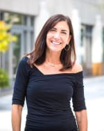 Click to view profile of Lori Lopez Guzzo, a top rated Child Support attorney in Seattle, WA
