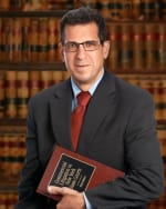 Click to view profile of Warren S. Dank, a top rated Business Litigation attorney in Syosset, NY
