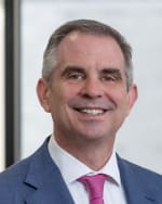 Click to view profile of John F. 