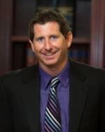 Click to view profile of Ryan S. Ginie, a top rated Car Accident attorney in Olathe, KS