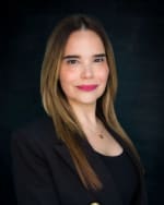 Click to view profile of Dolly Hernandez, a top rated Business Litigation attorney in Miami, FL