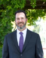 Click to view profile of Aaron Garrett, a top rated Personal Injury - Defense attorney in Albuquerque, NM