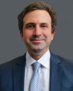 Click to view profile of Mario de la Garza, a top rated Trucking Accidents attorney in Houston, TX