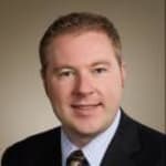 Click to view profile of Travis L. DeLucenay a top rated Tax attorney in Milwaukee, WI