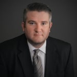 Click to view profile of Garrett Tuck a top rated Brain Injury attorney in Kansas City, MO
