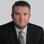 Click to view profile of Garrett Tuck a top rated Trucking Accidents attorney in Kansas City, MO