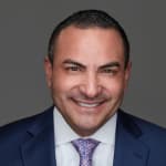 Click to view profile of Johnny Garza, Jr. a top rated Construction Accident attorney in Houston, TX