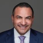 Click to view profile of Johnny Garza, Jr., a top rated Car Accident attorney in Houston, TX