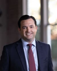 Justin C. Dewett