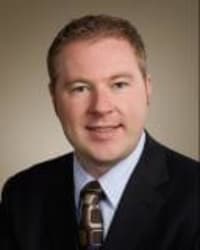 Travis L. DeLucenay