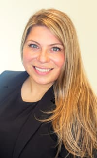 Lauren E. Saint